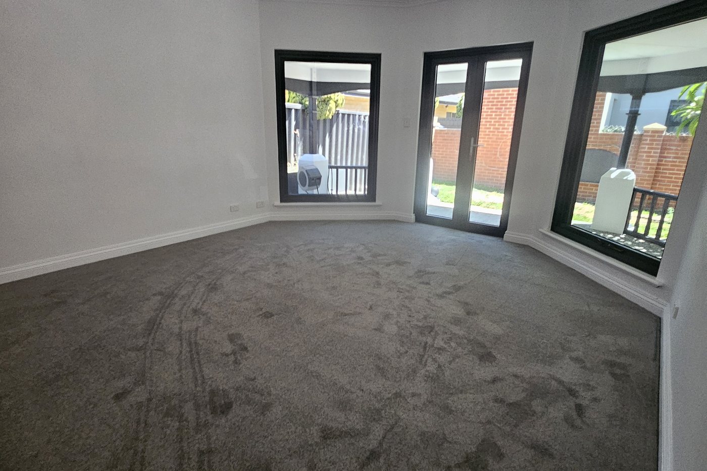 Before — vacant living room