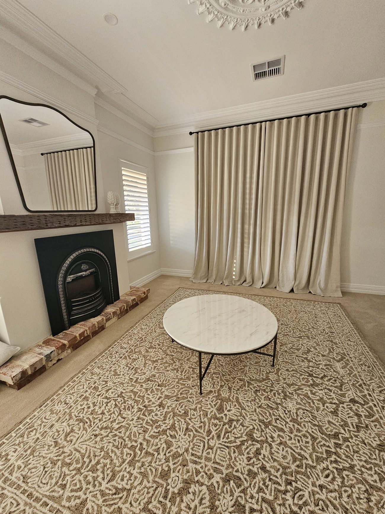 Emma Pasqua Interiors styled living room with drapery